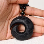 Ppxstar black obsidian protection jewelry pendant front view | people ​planet  x star