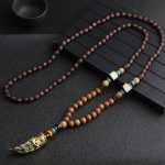 Ppxstar chakra necklace hand carved wood beads texture macro | people ​planet  x star