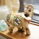 Ppxstar front view elephant figurine on shelf | people ​planet  x star