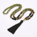 Ppxstar green jasper stone beads closeup with tiger eye beads | people ​planet  x star