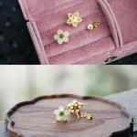 Ppxstar white jade flower studs front | people ​planet  x star