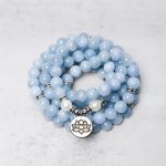 Ppxstar bracelets spiritual aquamarine mala wrap stacked on wrist side angle | people ​planet  x star