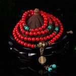Ppxstar turquoise bracelet red beads closeup hand knotted detail | people ​planet  x star