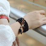 Ppxstar black obsidian bracelet lucky charm bracelet wrist shot | people ​planet  x star