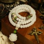 Ppxstar protection necklace bodhi seed mala closeup | people ​planet  x star
