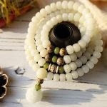 Ppxstar jade pendant necklace white jade lotus front hide | people ​planet  x star