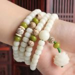 Ppxstar protection necklace bodhi seed mala closeup down | people ​planet  x star