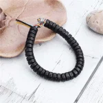 Ppxstar hematite bracelet model hand side angle | people ​planet  x star
