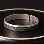 Ppxstar lotus symbol cuff front | people ​planet  x star